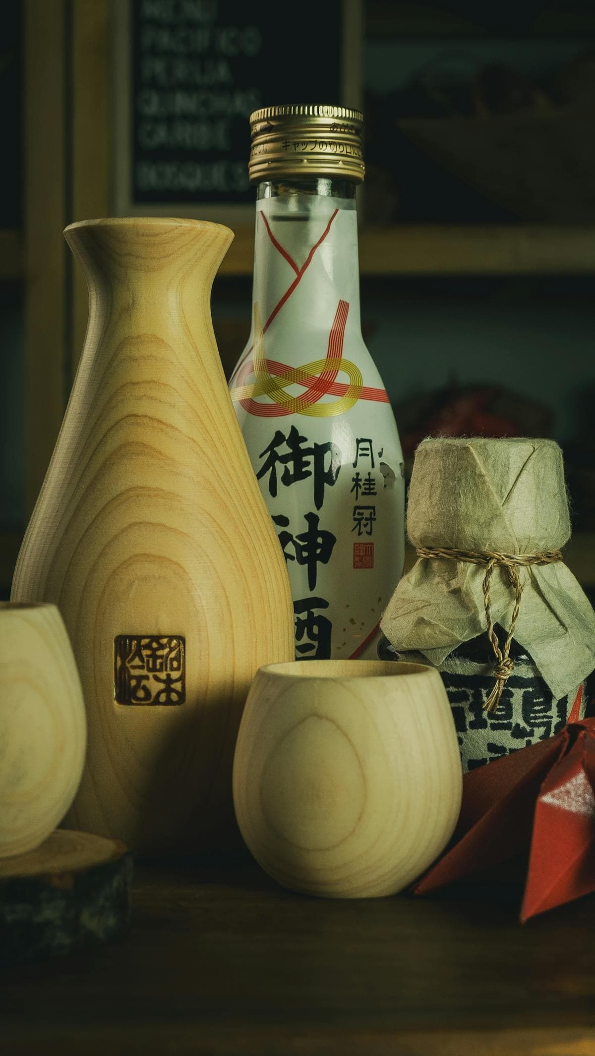 A wooden sake flask and bottle styled as a Japanese gift
